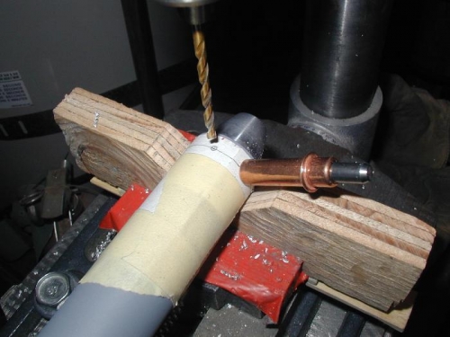 Drilling the tube to the end cap