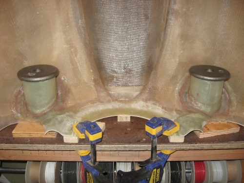 Weights used to keep parts in position and stable during cure