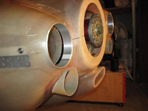 A side view of vents protruding from lower cowling.  Some trimming is required.