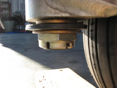 Nose wheel Axle nut with cotter key.