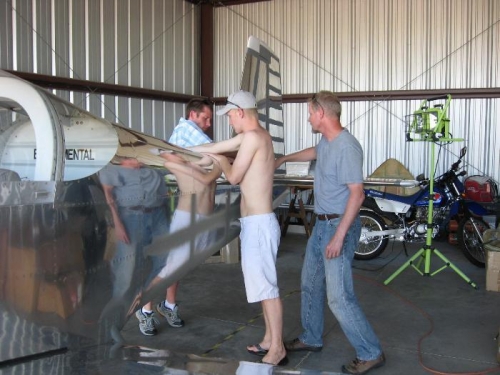 Travis and Darren being instructed on where to push on the tail