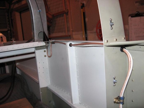 The white remote wire continues forward to the remote switch in the panel