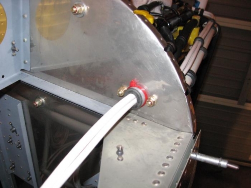 Firewall pass-thru for primary power wiring (cabin side)