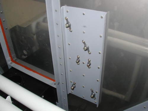 Backing plate for firewall mounted electrical components