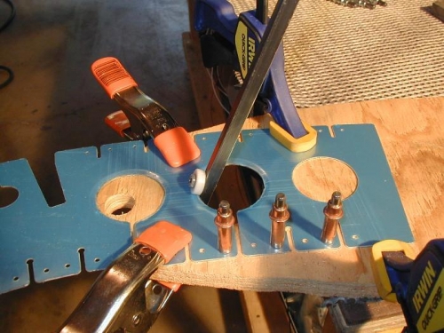 Modified edging tool with piece clamped securely.
