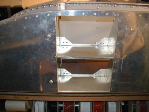 D100 trays riveted in place