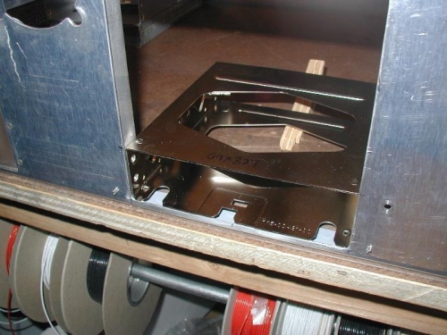 The GTX-327 radio tray is set in position for drilling to vertical rails