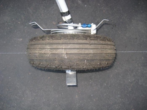 Closer look shows how the tire is not aligned with slipstream, but wheel pant will be