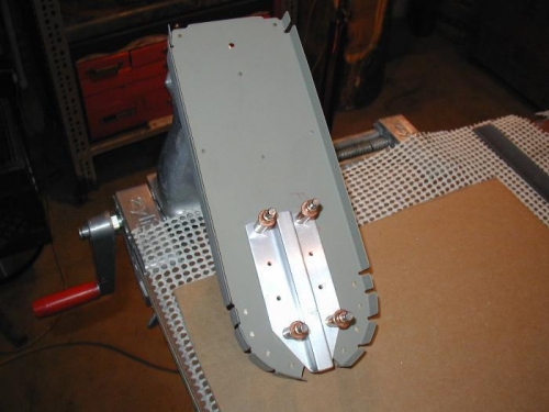 Tie-down mount on the foreward surface