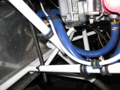 Right side coolant hoses and ground strap secured