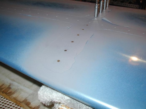First rivets in the skin!  HS-707 rib underneath
