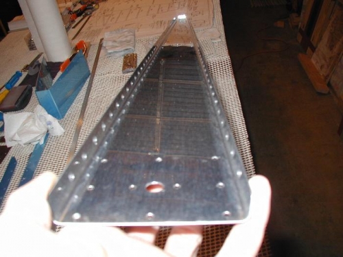 Rudder spar deburred and dimpled