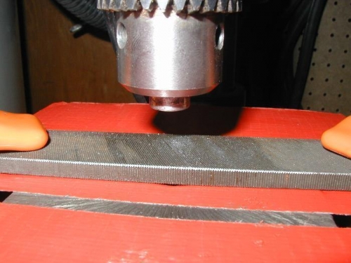 Using drill press to surface rivet set face