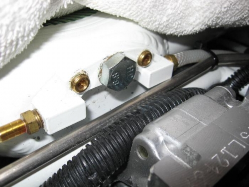 Plug installed in manifold where Air Temp probe was.