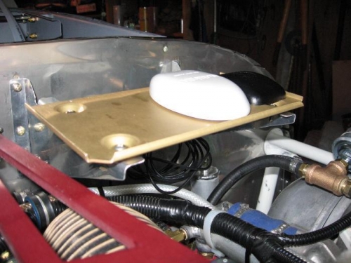 #8 screws through firewall into nutplates secure the tray