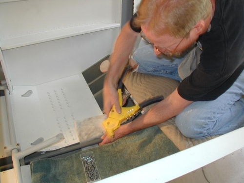 Riveting the rod ends to the F-789 after it's placed in the tunnel