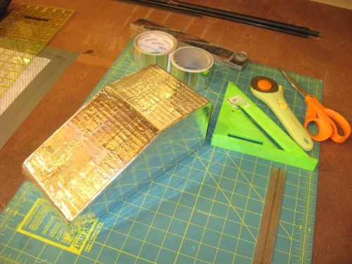 Mold covered with aluminum tape.  Prior to glassing, a mold release will be applied.