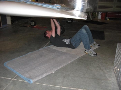 Darren working with the bell-crank assembly in the left wing