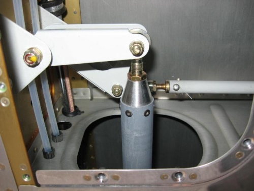 A view from beneath the left wing access panel of the bell-crank