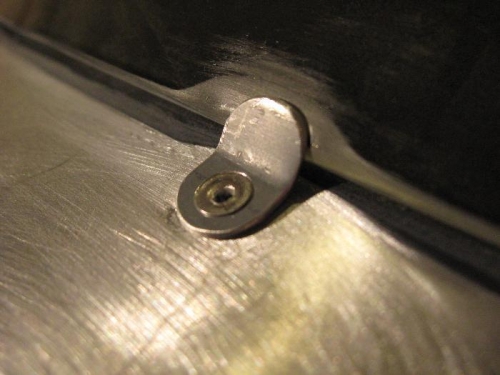 Closeup of the clip and plexiglas ground away