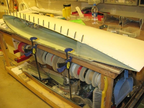 1/2 the nut-plates installed with the .032 backing strip