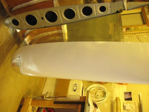 Wing tip held in place with a few #6 screws.  Cool!