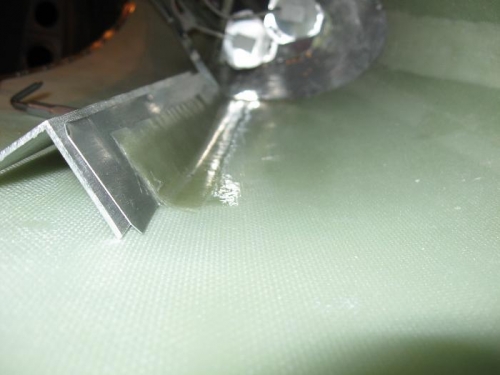 Shot from within the tip looking at the Com antenna propped up while the fiberglass cures