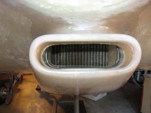 Oil cooler vent joins to plenum