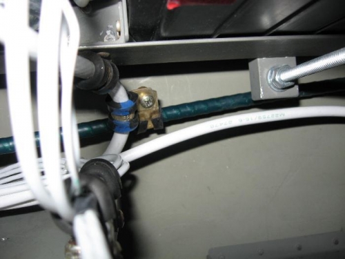 Used clamps to keep the positive battery cable free of the trim tab cable