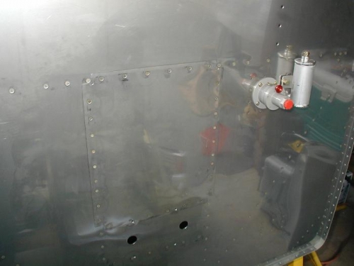 Cover riveted in place