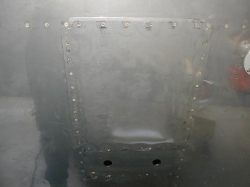 Another view.  Ding is just to the left of the 4th rivet up from the bottom right