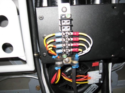 Terminal strip secured to heater case