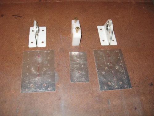 Nut-plates will be installed later, and also a stiffening bend will be added to the long edges.