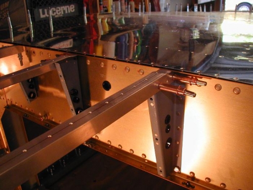 Center floor stiffeners drilled to F-783B cover support rib
