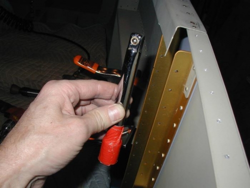 A curious but perfect use of a socket extension as a bucking bar!