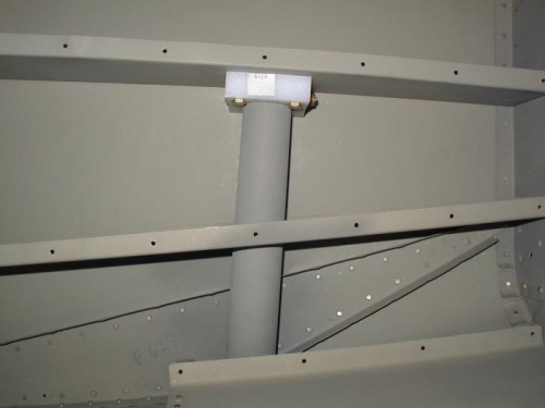 Secured to baggage rib