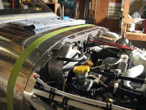 Fastener strips riveted in place