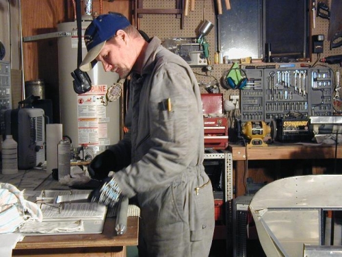 Here I am checking plans while making the Elevator pushrod tube