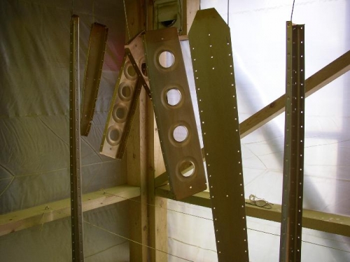 Vertical Stabilizer Components Hanging to dry after Alumiprep and Alodine