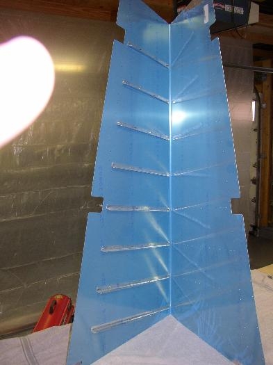 Stiffeners cleco'd on to the rudder skin for match drilling