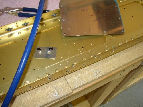 Wing Access Panel requires four platenuts added to flange of main spar