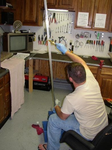 Anton preparing one of the spars for primer
