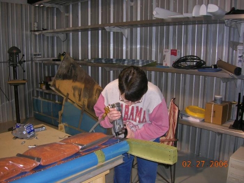 Reva squeezing her first rivets