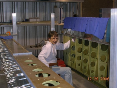 Threading conduit into the wing.