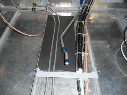 Foam installed under fuel & brake lines