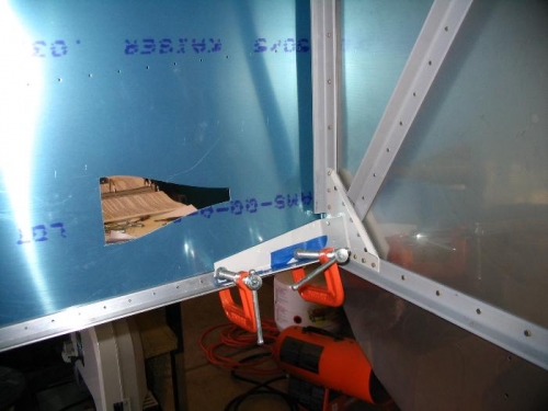 WD-602 clamped to longeron prior to drilling