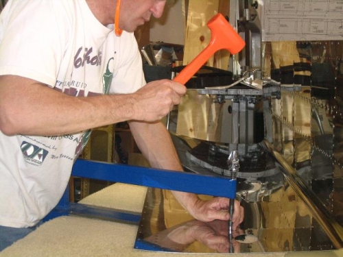 Dimpling the tank skin