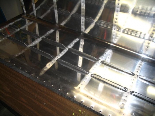 Tank stiffeners back riveted in place