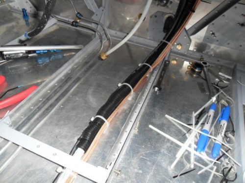 Chafe protection for center tunnel wiring