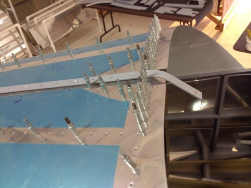 Canopy slide rail initial fitting